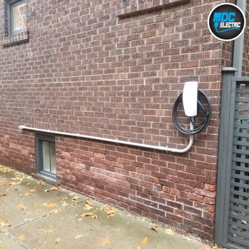 Tesla EV charger outdoors Toronto by MDC Electric